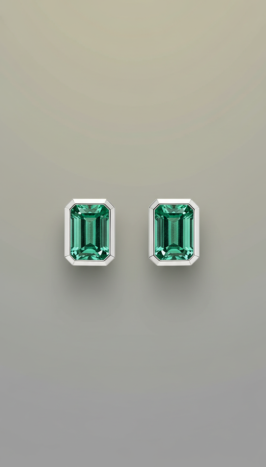 Platinum emerald-cut stud earrings